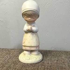 Precious Moments “Thanking Him For You” figurine.